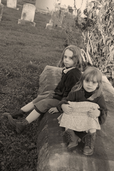Two children in cemetery
