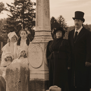 People standing in cemetery