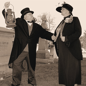 Man and a woman in the cemetery