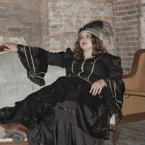 Woman lounges in a chair