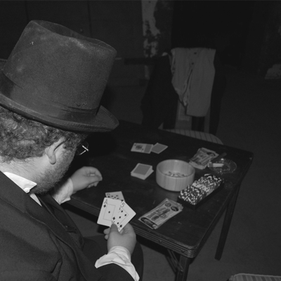Man playing poker at table