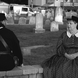 Woman and man in cemetery