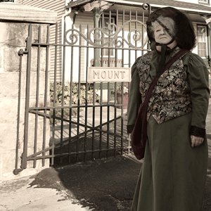 Woman beside cemetery