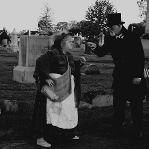 Woman and man in cemetery