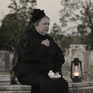 Woman in cemetery