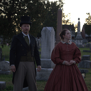 Man and woman in cemetery