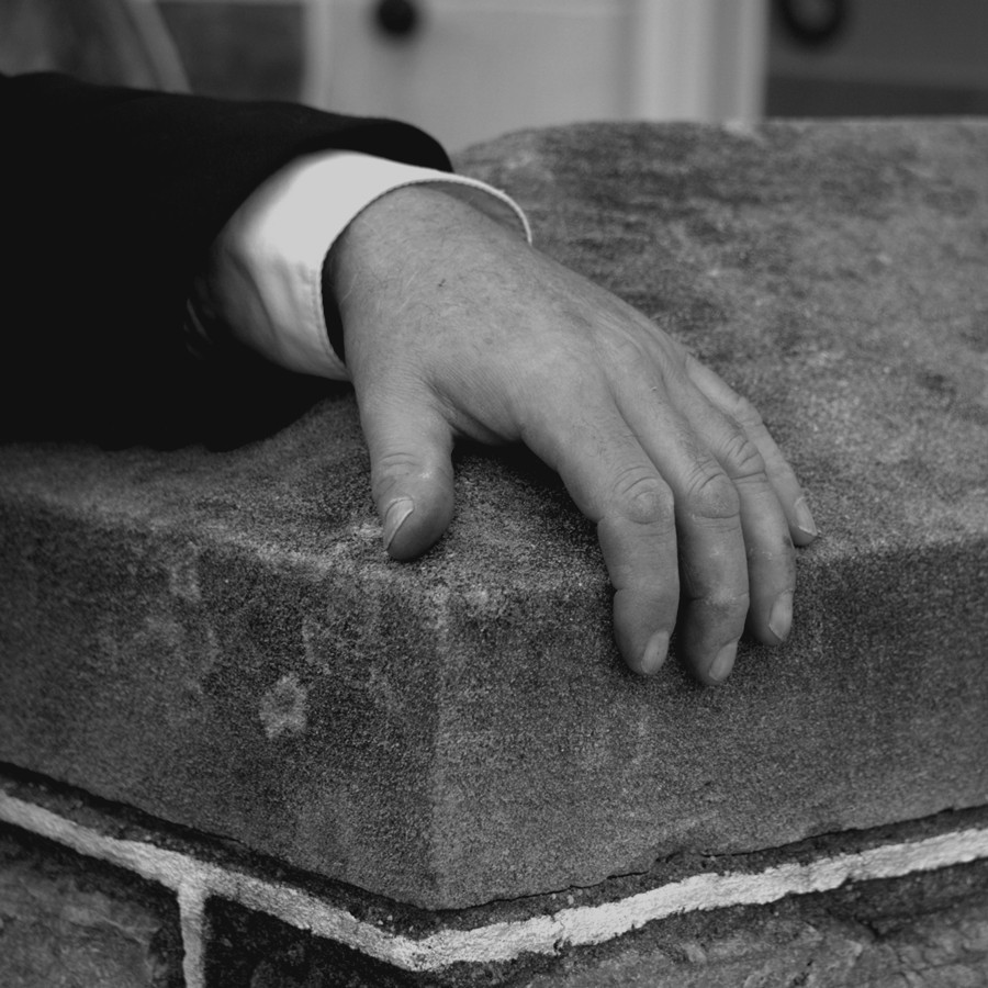 Hand on grave